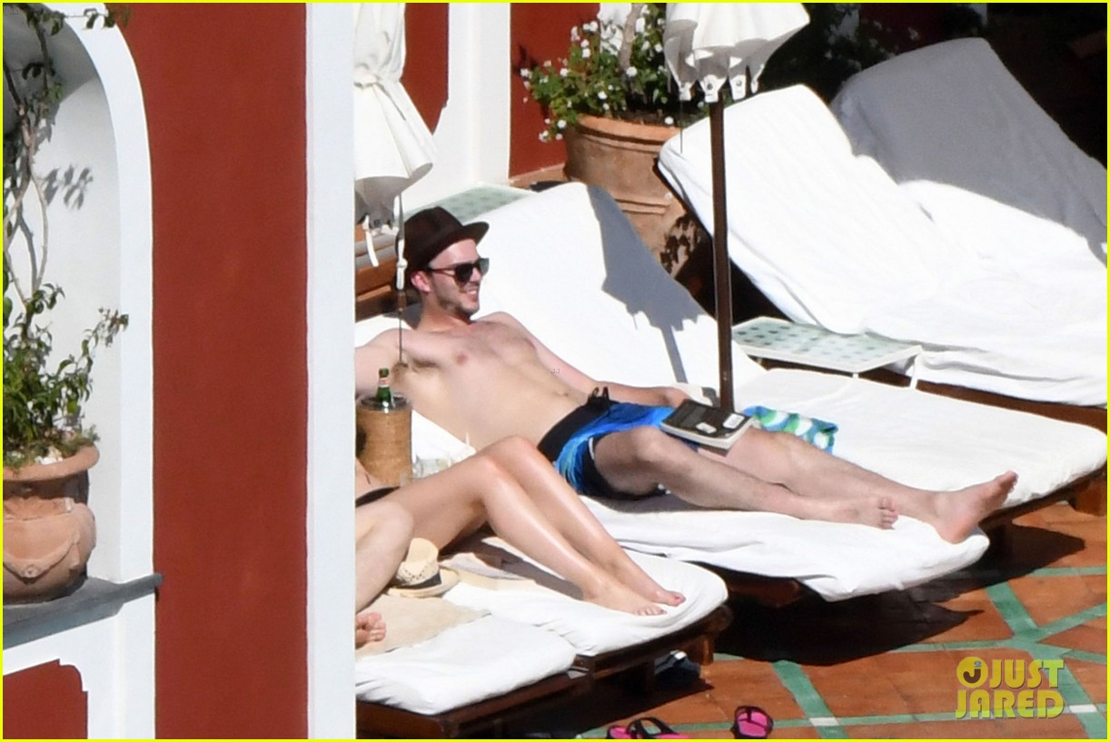 nicholas hoult shirtless by the pool 29
