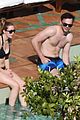 nicholas hoult shirtless by the pool 01