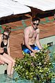 nicholas hoult shirtless by the pool 14