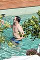 nicholas hoult shirtless by the pool 21