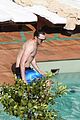 nicholas hoult shirtless by the pool 23