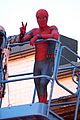 tom holland suits up on the set of spider man homecoming 02