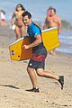 taylor lautner spends sunday catching waves 01