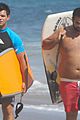 taylor lautner spends sunday catching waves 05