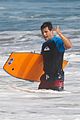 taylor lautner spends sunday catching waves 08