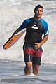 taylor lautner spends sunday catching waves 10