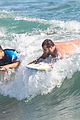 taylor lautner spends sunday catching waves 14