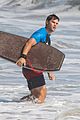 taylor lautner spends sunday catching waves 24