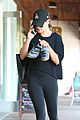 lea michele carries shoes soul cycle class 02
