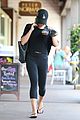 lea michele carries shoes soul cycle class 12