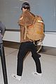 rob pattinson hurries to catch a flight out of lax airport 04