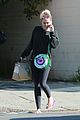 miley cyrus strips off her sweater for a visit to the nail salon 01