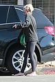 miley cyrus strips off her sweater for a visit to the nail salon 16