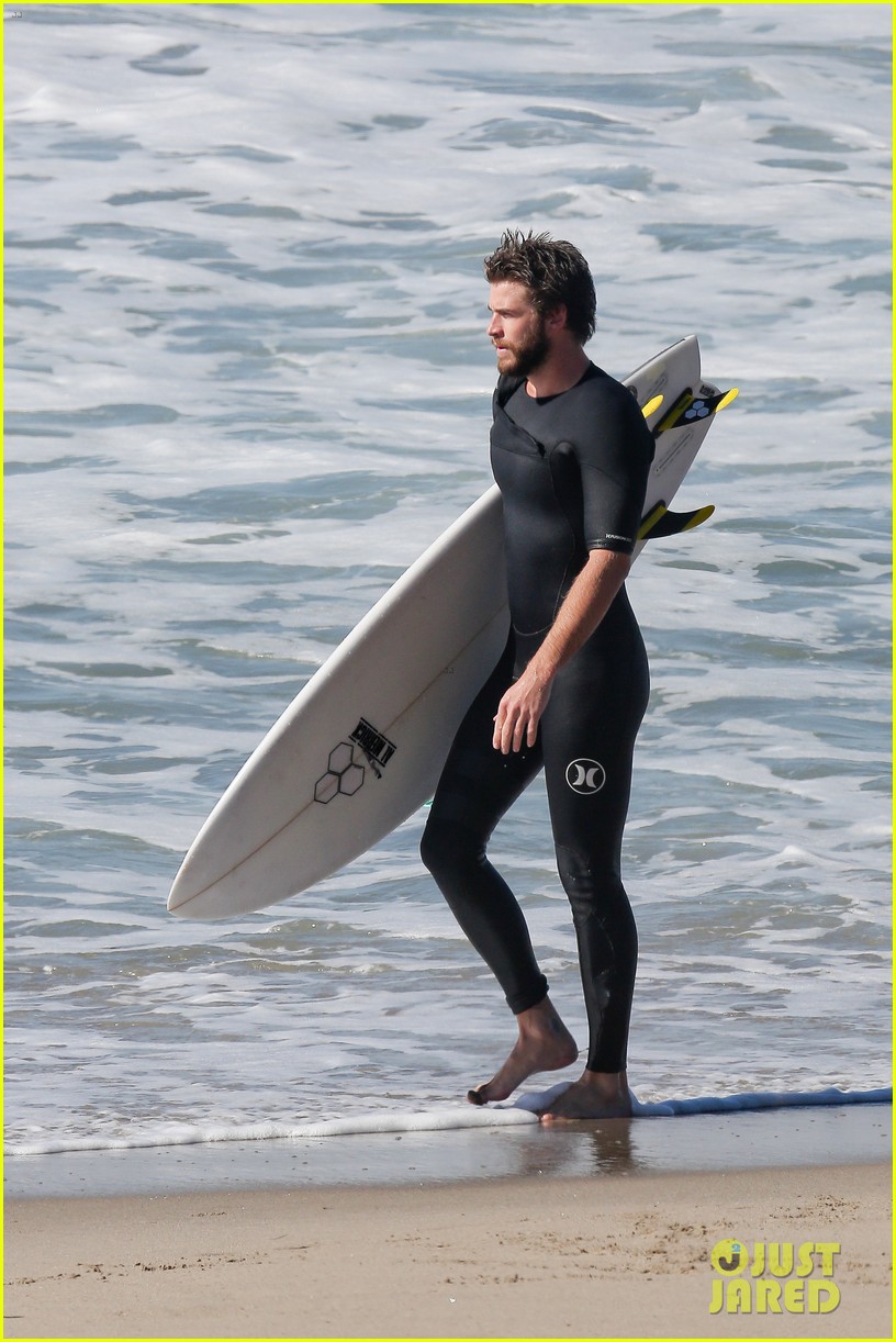 liam hemsworth goes for monday morning surf session with brother luke 08