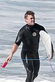 liam hemsworth goes for monday morning surf session with brother luke 13