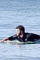 liam hemsworth goes for monday morning surf session with brother luke 30