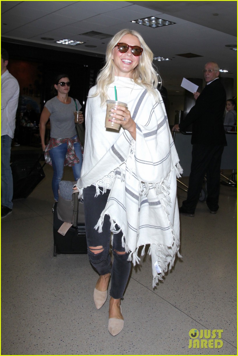 julianne hough grabs an iced coffee after arriving at lax airport 07
