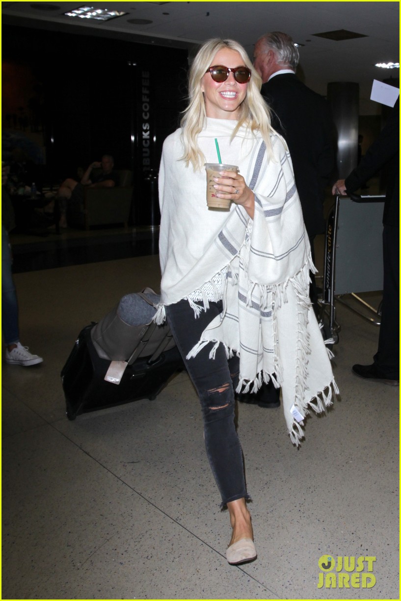 julianne hough grabs an iced coffee after arriving at lax airport 09