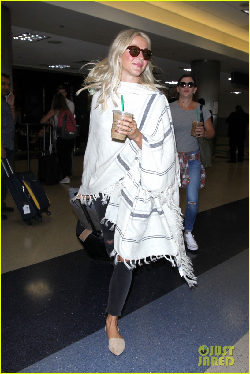 julianne hough grabs an iced coffee after arriving at lax airport 11