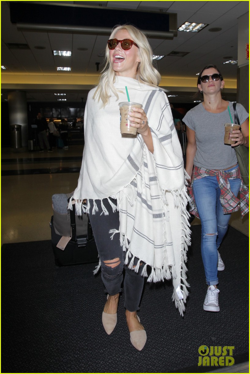 julianne hough grabs an iced coffee after arriving at lax airport 12