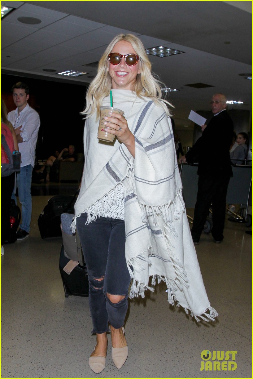 julianne hough grabs an iced coffee after arriving at lax airport 15