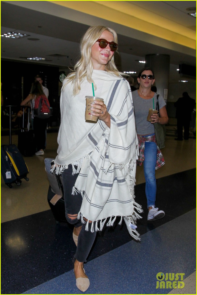 julianne hough grabs an iced coffee after arriving at lax airport 18