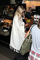 julianne hough grabs an iced coffee after arriving at lax airport 03