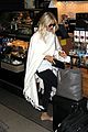 julianne hough grabs an iced coffee after arriving at lax airport 08