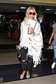 julianne hough grabs an iced coffee after arriving at lax airport 14