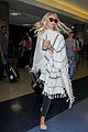 julianne hough grabs an iced coffee after arriving at lax airport 16