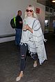 julianne hough grabs an iced coffee after arriving at lax airport 19