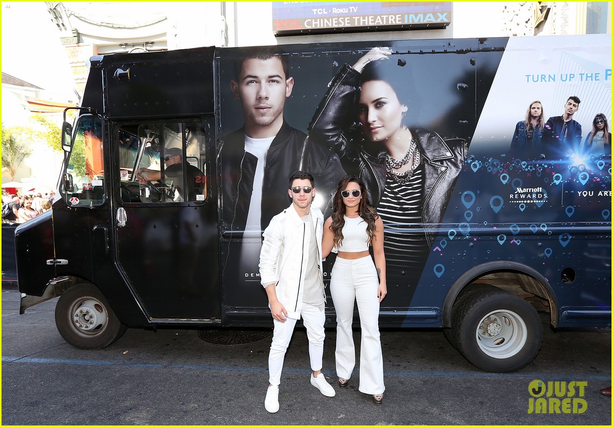 demi lovato and nick jonas surprise fans on hollywood blvd with some sweet treats 03