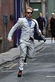 rupert grint suit running snatch filming 17
