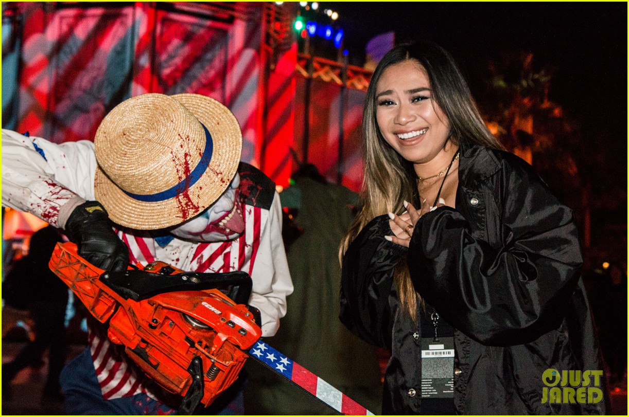bella thorne tyler posey couple up at halloween horror nights 12