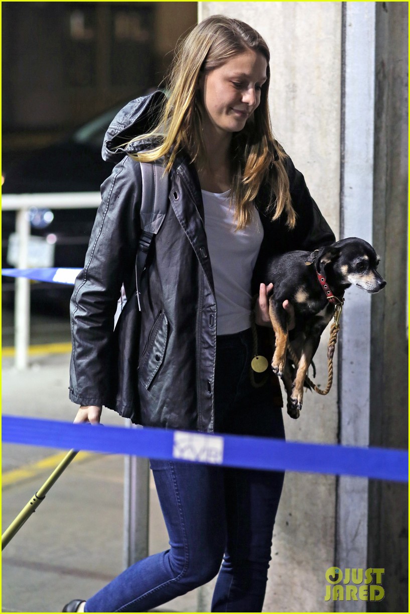 melissa benoist heads back to her hotel after filming cw crossover 06