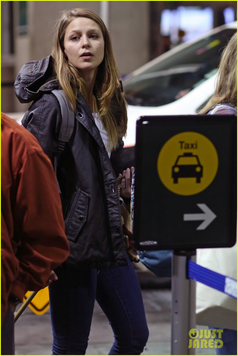 melissa benoist heads back to her hotel after filming cw crossover 09