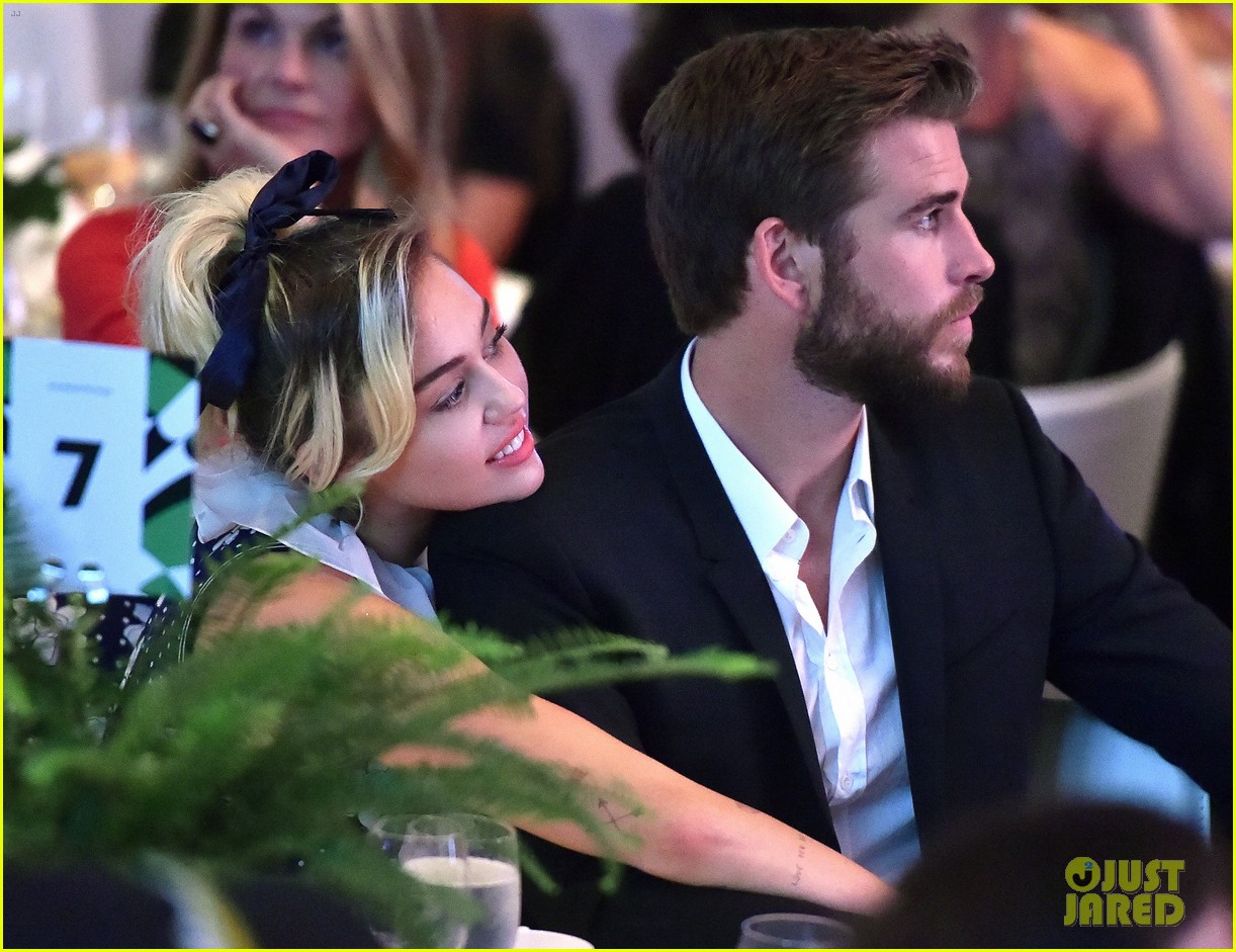 miley cyrus and liam hemsworth couple up at varietys power of women luncheon 05