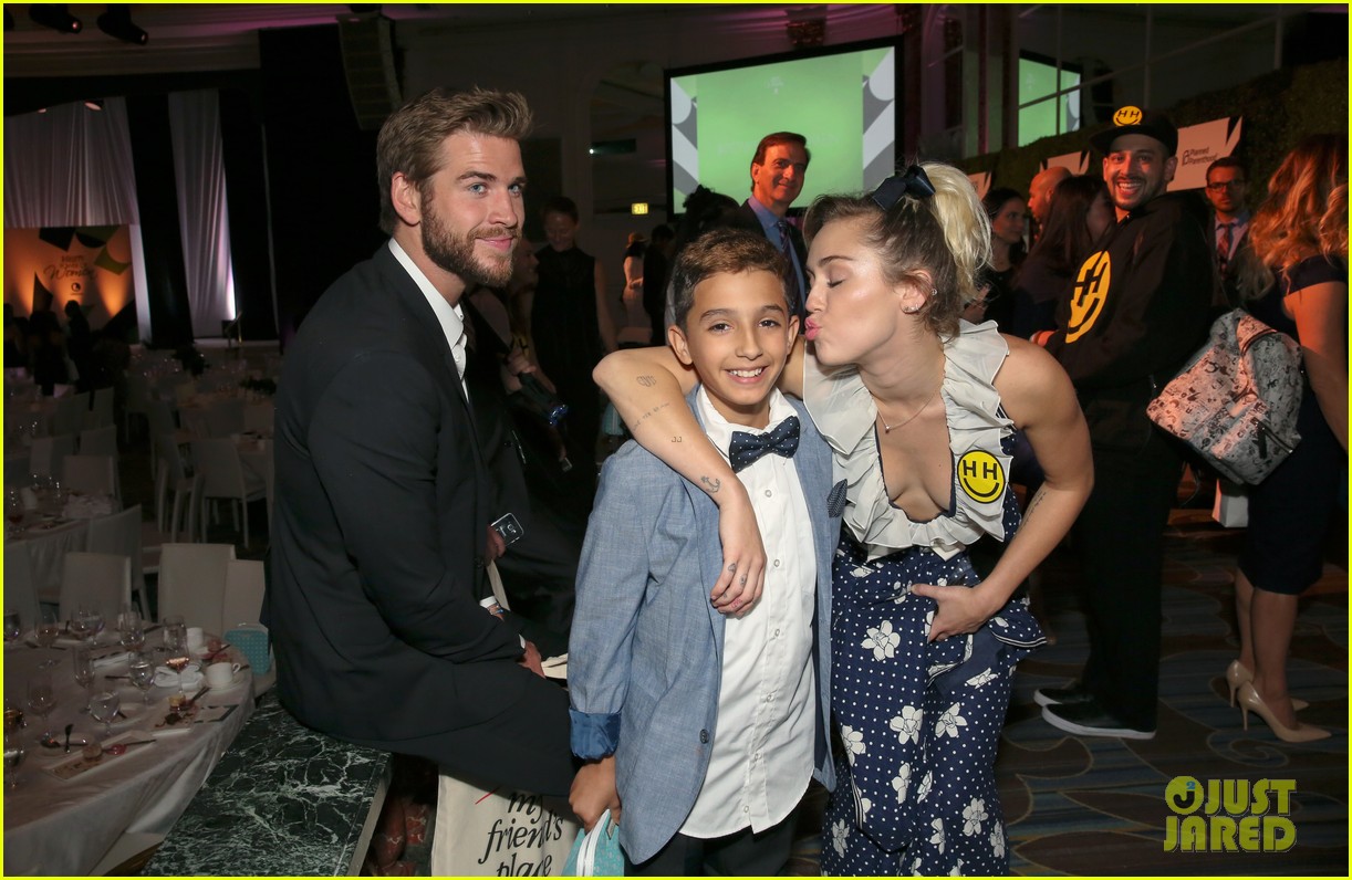 miley cyrus and liam hemsworth couple up at varietys power of women luncheon 25