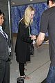 elle fanning brings back the 90s while heading to her flight 05