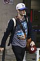 stephen amell grant gustin vancouver airport 03