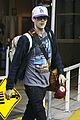 stephen amell grant gustin vancouver airport 05