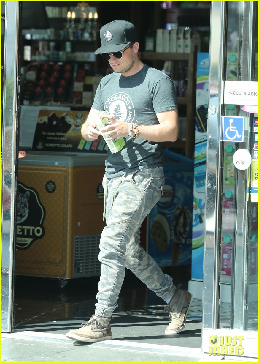 josh hutcherson fills up his car at a gas station in beverly hills 01