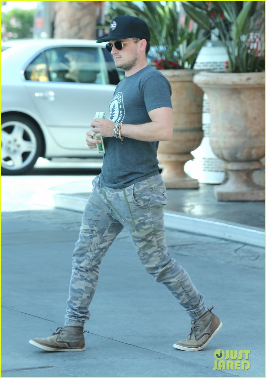 josh hutcherson fills up his car at a gas station in beverly hills 08