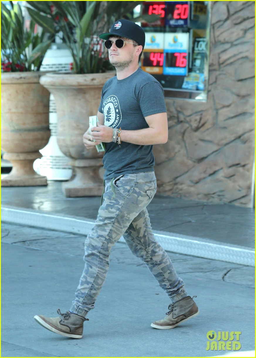 josh hutcherson fills up his car at a gas station in neberly hills 05