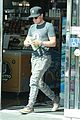 josh hutcherson fills up his car at a gas station in beverly hills 01