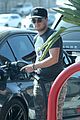 josh hutcherson fills up his car at a gas station in beverly hills 04