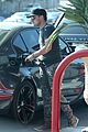 josh hutcherson fills up his car at a gas station in beverly hills 10