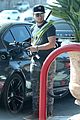 josh hutcherson fills up his car at a gas station in neberly hills 11