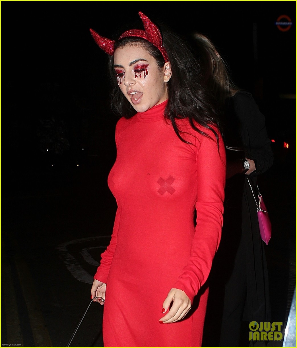 suki waterhouse steps out in a see through dress for halloween event 10
