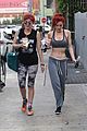 bella thorne shows off new bright red and yellow hair color at the gym 03